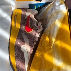 Nike Sneakers with Brown and Red Accents